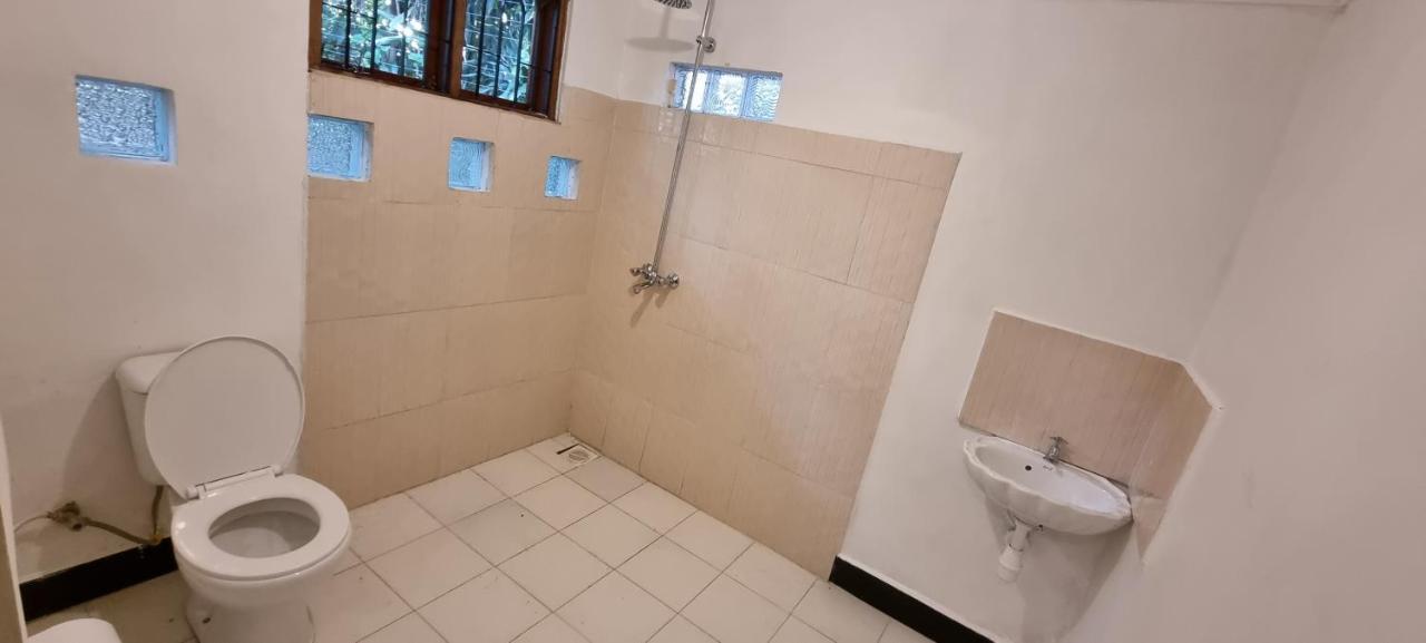 Kizumba House Hostel อารูชา ภายนอก รูปภาพ