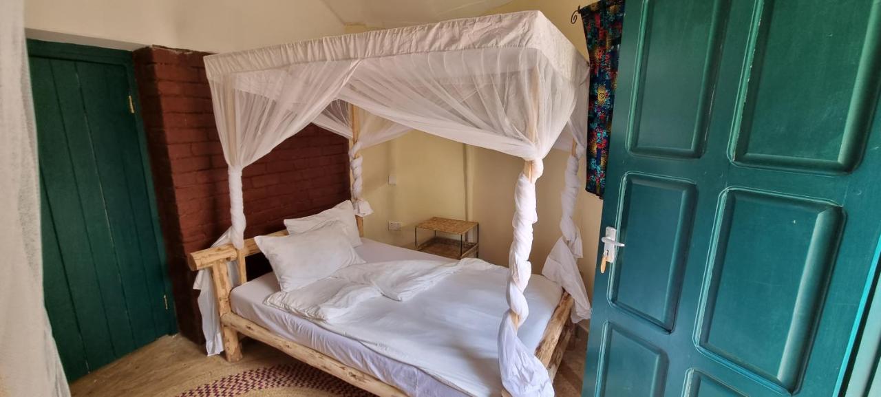 Kizumba House Hostel อารูชา ภายนอก รูปภาพ