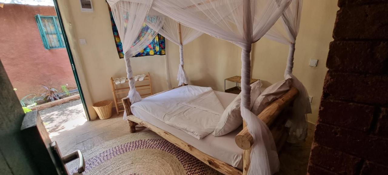 Kizumba House Hostel อารูชา ภายนอก รูปภาพ