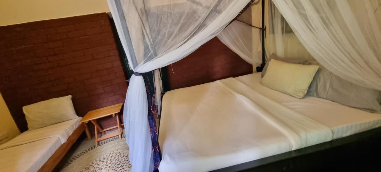 Kizumba House Hostel อารูชา ภายนอก รูปภาพ
