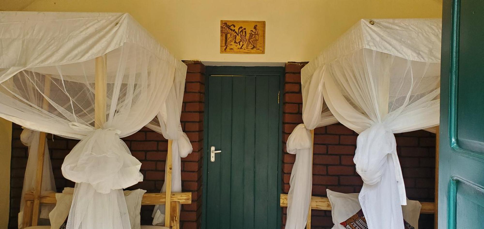 Kizumba House Hostel อารูชา ภายนอก รูปภาพ